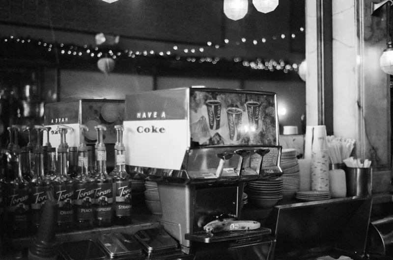 The Soda Fountain Mistake That Built an Empire: How One Pharmacist's Bad Day Created America's Favorite Fizz